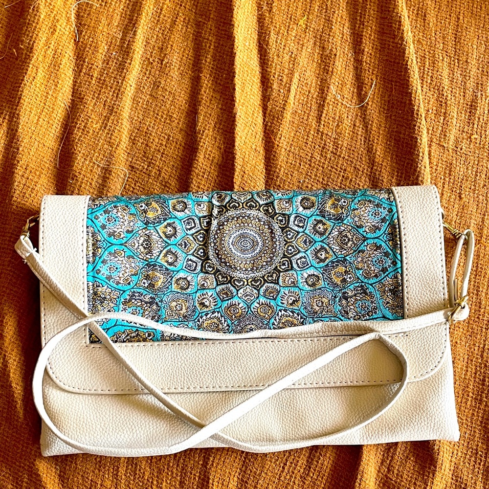 Off white handbag with adjustable removable strap